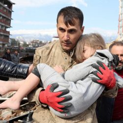 Muhammet Ruzgar, 5, is carried out by a rescuer from the site of a damaged building, following an earthquake in Hatay, Turkey, February 7, 2023. REUTERS/Umit Bektas     TPX IMAGES OF THE DAY
